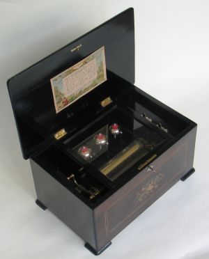 A &quot;3 bells in sight&quot; cylinder musical box